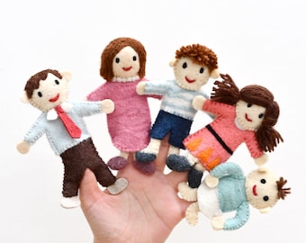 May include: Five felt finger puppets depicting a family. The puppets are brown, pink, blue, light blue, and pink. The puppets are all smiling and have brown hair.