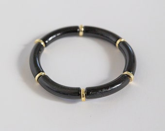 Bracelet tube perle noir et or