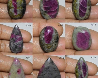 Puede incluir: Surtido de diez piedras preciosas en cabujón de forma ovalada y de lágrima con patrones rosas, verdes y grises.