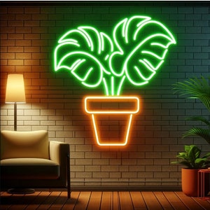 May include: Neon sign of a potted plant with green leaves and an orange pot against a brick wall background.