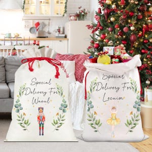May include: Two white Christmas gift bags with red drawstrings. The bag on the left has a nutcracker illustration and the text "Special Delivery For Waeful". The bag on the right has a ballerina illustration and the text "Special Delivery For Lecium".