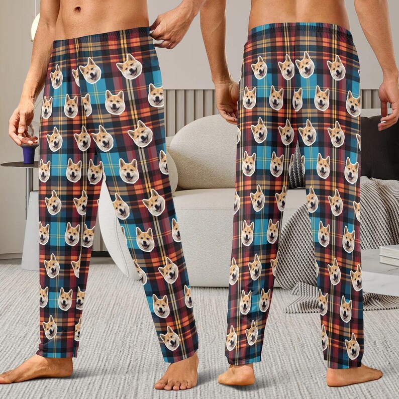 May include: Blue and red tartan pyjama trousers with a repeated pattern of a dog's face.