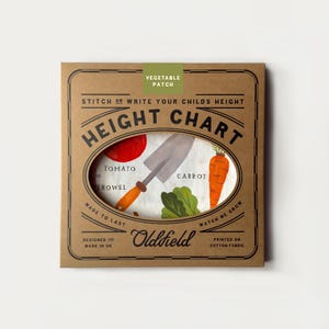 May include: A height chart with a vegetable garden theme. The chart features a tomato, carrot, and trowel illustration. The text on the chart reads "Height Chart" and "Stitch or write your child's height." The chart is printed on cotton fabric.