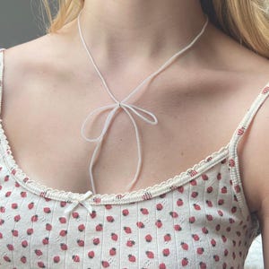 White Beaded Bow Necklace