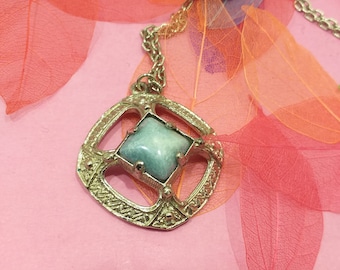 Vintage celtic pendant with pale blue stone and long chain