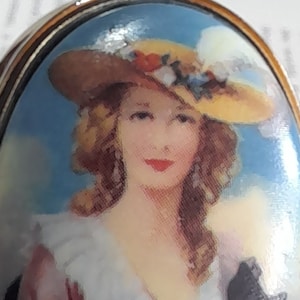 Vintage little pill box, with lady in period costume design