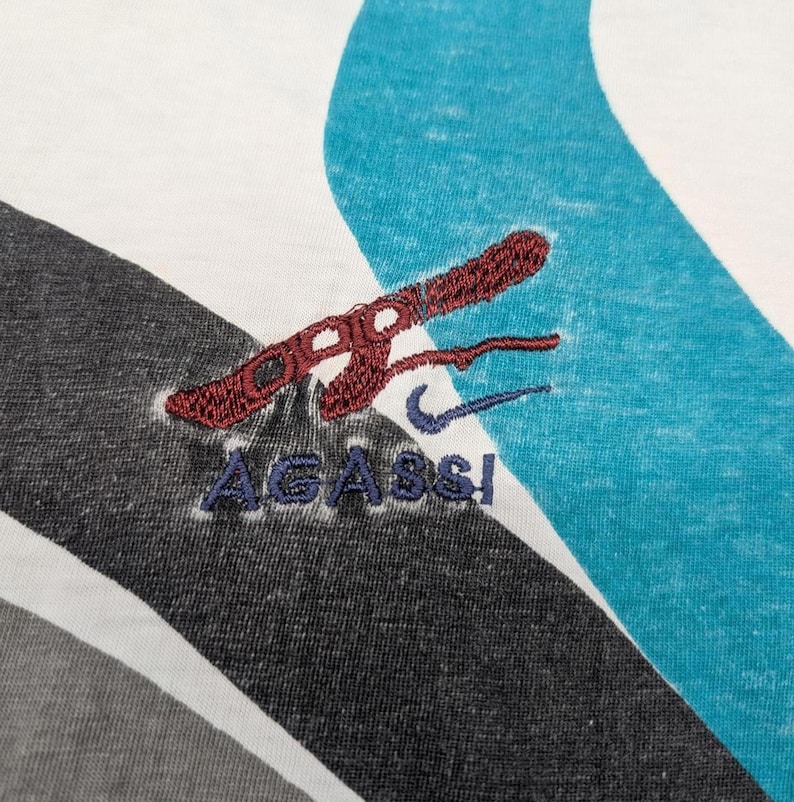 Rara polo da tennis vintage anni '90 di Andre Agassi Nike Boot immagine 2