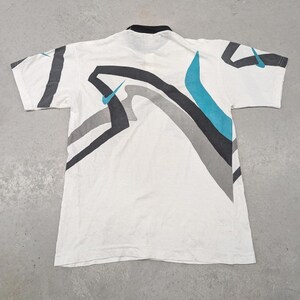 Rara polo da tennis vintage anni '90 di Andre Agassi Nike Boot immagine 4