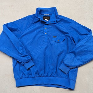 Vintage Eddie Bauer blue light pull over windbreaker jacket