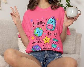 Happy to See Your Face T-shirt | Cute School Supplies Globe Backpack Drink Stars