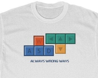 May include: White t-shirt featuring a graphic of a keyboard's WASD keys and arrow keys. The text "ALWAYS WRONG WAYS" is printed below the graphic.