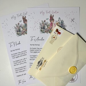 May include: Two personalized Easter cards with a bunny rabbit illustration and a poem. The cards are addressed to Noah and Amelia. The cards are decorated with pink and gray polka dots and a dragonfly.