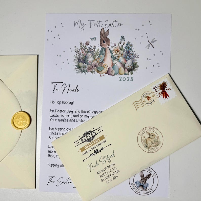 May include: A white envelope with a bunny rabbit illustration and the text "Easter Bunny Delivery" in a gold circle. The envelope is addressed to Noah Stafford at 45 Elm Road, Hucclecote, Gloucester, GL3 3RH. The envelope has a gold wax seal and a stamp with a red and yellow design.