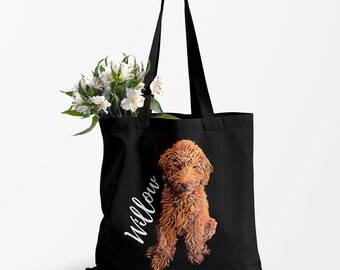 May include: Black canvas tote bag featuring a brown doodle dog illustration and the name "Willow" in white text.