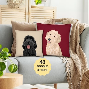 May include: Three decorative throw pillows on a gray sofa. Two pillows feature dog portraits, one black and one cream-colored, against solid backgrounds. A third pillow is a solid beige color. A yellow sticker reads "48 Doodle Options."