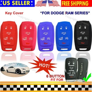 May include: A collection of key covers in red, blue, and black, designed for Dodge Ram series vehicles. The covers feature a 6-button design and are labeled "US Seller" and "Free Shipping."