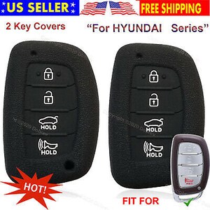 May include: Two black key covers with white icons for a Hyundai series vehicle. The key covers have buttons for lock, unlock, and other functions. The image also includes a key fob and text that says "US Seller" and "Free Shipping".