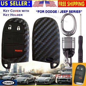 May include: Black key fob cover with a carbon fiber pattern, featuring buttons for lock, unlock, and panic. Includes a key holder and screwdriver. Text on the key fob reads "PANIC". The product is designed for Dodge and Jeep series vehicles.