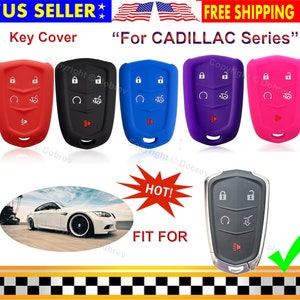 May include: Key covers in red, black, blue, purple, and pink, designed for Cadillac series keys. The image includes a car and the text "HOT!" and "FIT FOR".