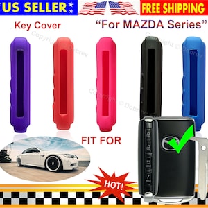 May include: Key covers in purple, red, pink, black, and blue. The covers are designed for Mazda series keys. The image includes a car and the text "US Seller", "Free Shipping", "Fit For", and "Hot!"