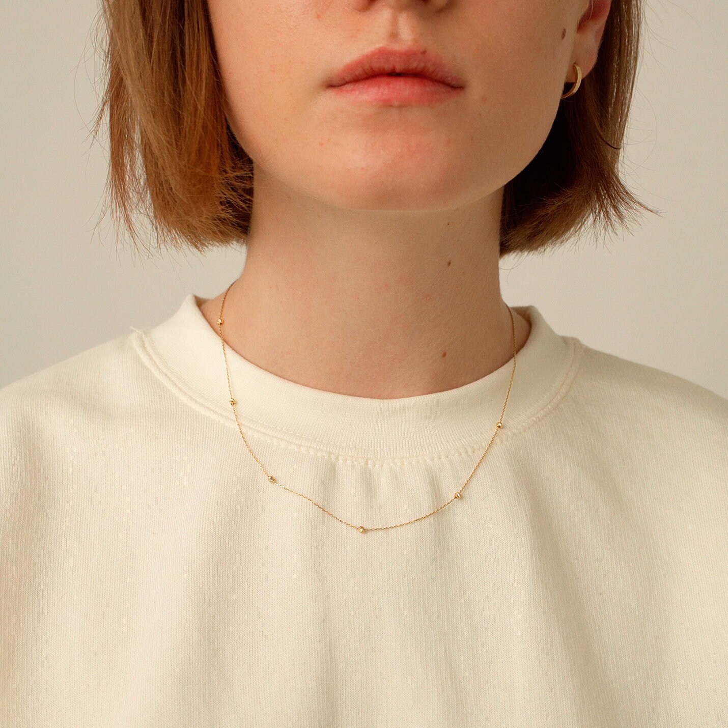 14k gold bead on sale station necklace
