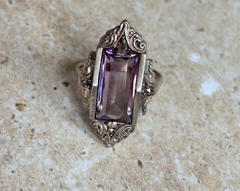 pretty silver and amethyst like stone ring