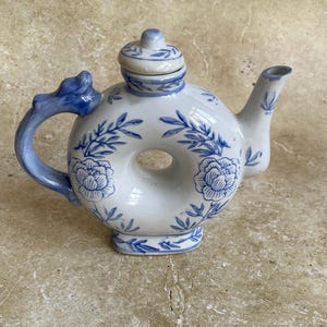Vintage blue and white Chinese teapot.