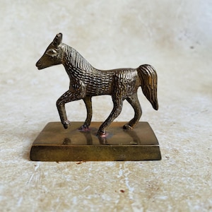 Small brass horse figurine