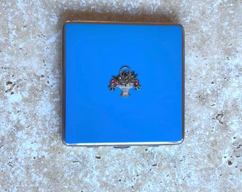 Vintage Dubarry blue enamel square compact with flower basket design