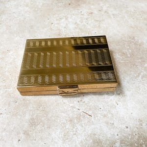 Vintage brass rectangular compact