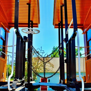 Railroad Photograph: Connecting Train Cars, a Giclée Color Print