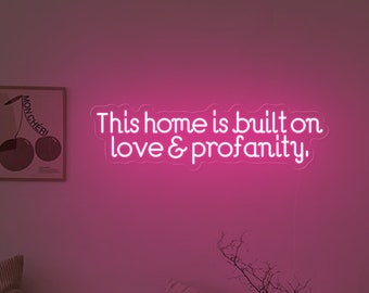 Cartello "Questa casa è costruita sull'amore e sulle parolacce", cartello decorativo da parete di benvenuto, regalo di inaugurazione della casa, regalo di nozze, cartello d'ingresso, decorazione per soggiorno