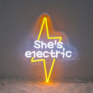 Letrero de neón "She's Electric", luz de neón con ambiente rockero, decoración de pared moderna para apartamentos, bandas de rock británicas, arte de neón con letras, arte de pared de moda