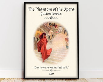 May include: A vintage poster for the novel "The Phantom of the Opera" by Gaston Leroux. The poster features an illustration of a masked figure in a red cloak walking down a staircase. The quote "Our lives are one masked ball." is printed below the illustration, along with the year 1910.
