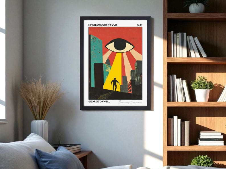 May include: Framed art print featuring a retro-style illustration. The artwork depicts a large eye with a beam of light shining on a silhouetted figure in a city. The title "Nineteen Eighty-Four" and author "George Orwell" are displayed.