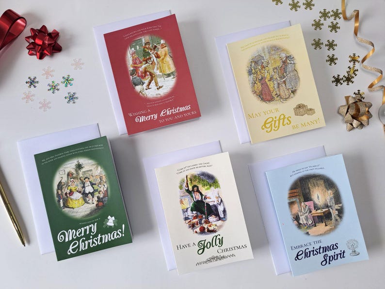 "A Christmas Carol" Christmas Card set of tiny cards that look like books with different images and colors depicting different parts of the classical book.