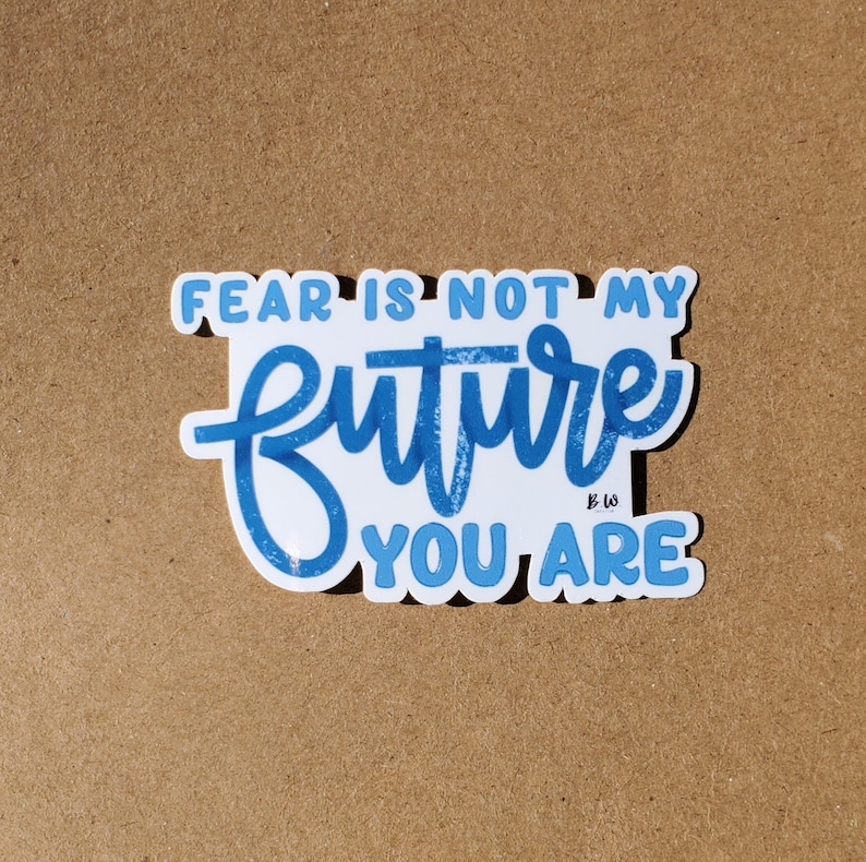 May include: Blue and white sticker with the text "Fear is not my future you are" in a handwritten style.