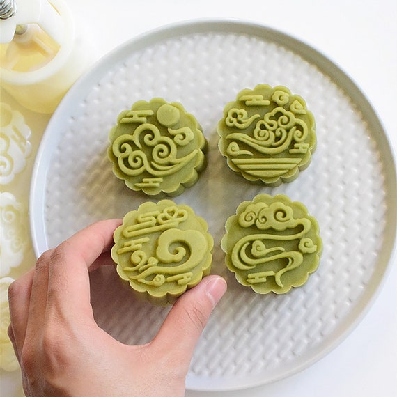 I designed and 3D printed a mooncake press mould, because why not