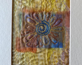Mounted Fabric Collage with Embroidery inspired by the Mediterranean.  Hand and Machine Stitched.