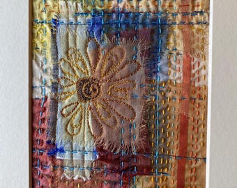 Mounted Fabric Collage inspired by the Mediterranean.  Hand and Machine Embroidery.