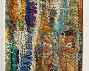Framed Fabric Collage inspired by the Mediterranean.  Hand and machine stitched.