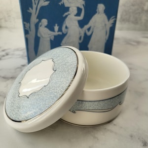 Vintage Wedgwood round lidded trinket jewelry box, collectible ceramic gift, classic blue and white decor, elegant keepsake, timeless charm