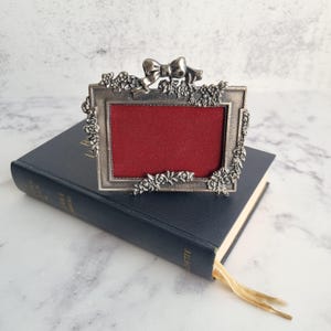Adorable small vintage floral and bow pewter frame, charming photo holder, shabby chic home decor, unique collectible, perfect for a gift