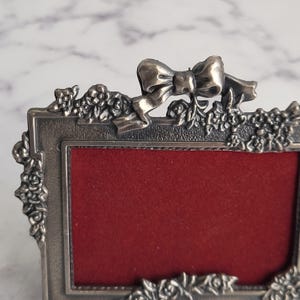 Adorable small vintage floral and bow pewter frame, charming photo holder, shabby chic home decor, unique collectible, perfect for a gift