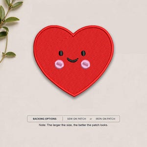 May include: A red heart-shaped embroidered patch featuring a smiling face with two black eyes, a black curved mouth, and two pink circular cheeks. The text below reads: BACKING OPTIONS: SEW ON PATCH or IRON ON PATCH. Note: The larger the size, the better the patch looks.