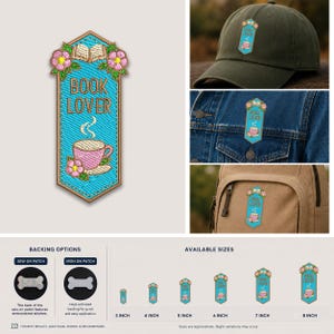 May include: An embroidered patch featuring a blue banner shape with the text BOOK LOVER in brown, an open book icon, pink flowers, and a steaming pink teacup. The patch is shown in various sizes from 3 inches to 8 inches with sew-on or iron-on backing.