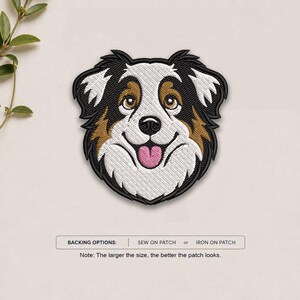 May include: An embroidered patch featuring the head of an Australian Shepherd dog with black, white, and tan fur, brown eyes, and a pink tongue. Below the patch, text reads: BACKING OPTIONS: SEW ON PATCH or IRON ON PATCH. Note: The larger the size, the better the patch looks.