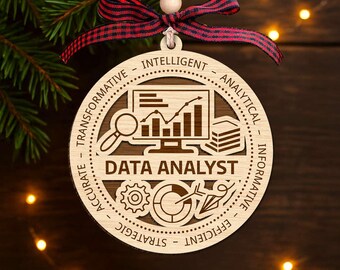 May include: Wooden Christmas ornament with the words "Data Analyst" and related icons. The ornament has a red and black plaid ribbon for hanging. The ornament is round and has the words "Intelligent", "Analytical", "Informative", "Efficient", "Strategic", "Accurate", and "Transformative" around the edge.