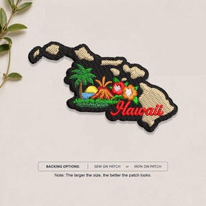 May include: An embroidered patch shaped like the Hawaiian islands with a black border, featuring a green palm tree, a yellow sun, a red volcano, and two hibiscus flowers in red and orange, with the word Hawaii stitched in red script.