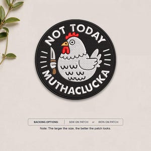 May include: A circular embroidered patch with a black background and a white border. The center features a white chicken with a red comb and wattle, holding a silver knife. The text "NOT TODAY MUTHACLUCKA" is stitched in white around the chicken.